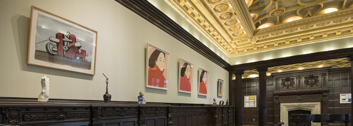 Photograph of Music Room with artwork on the walls