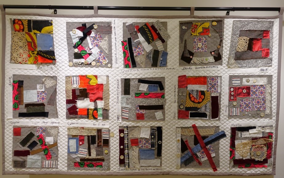 Quilt made of 15 collaged squares with different patterns.