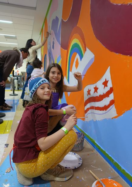 Janney students painting a mural