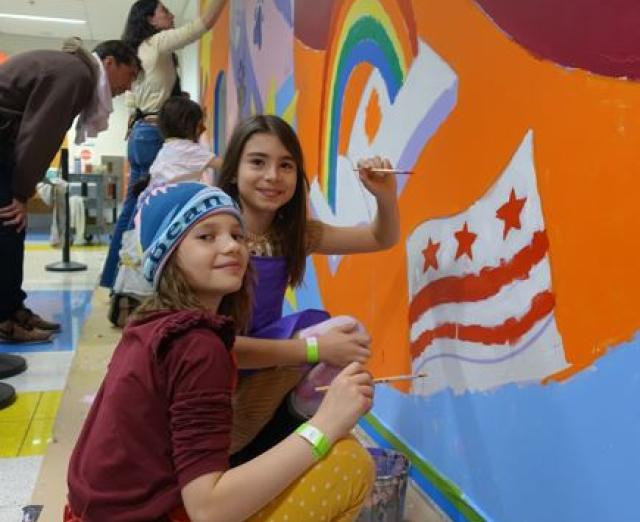 Janney students painting a mural