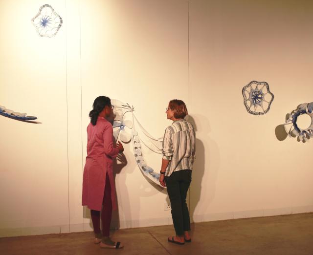 Ranjani Shettar and Vesela Sretenovic discuss an installation in progress.