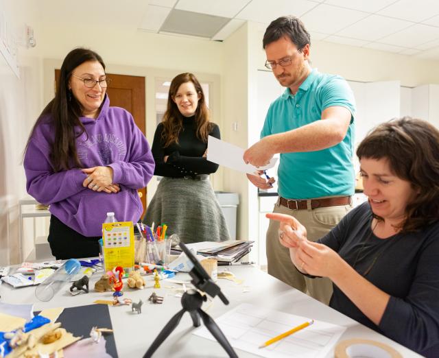 Kory Sutherland (right) with other UMD-Phillips Prism.K12 participants learn how to use stop-motion animation