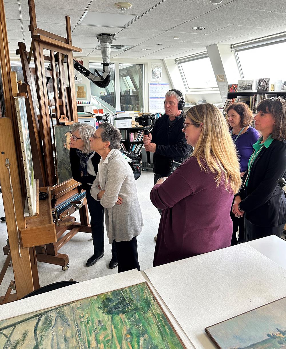 Phillips staff with museum colleagues in the Phillips conservation studio.