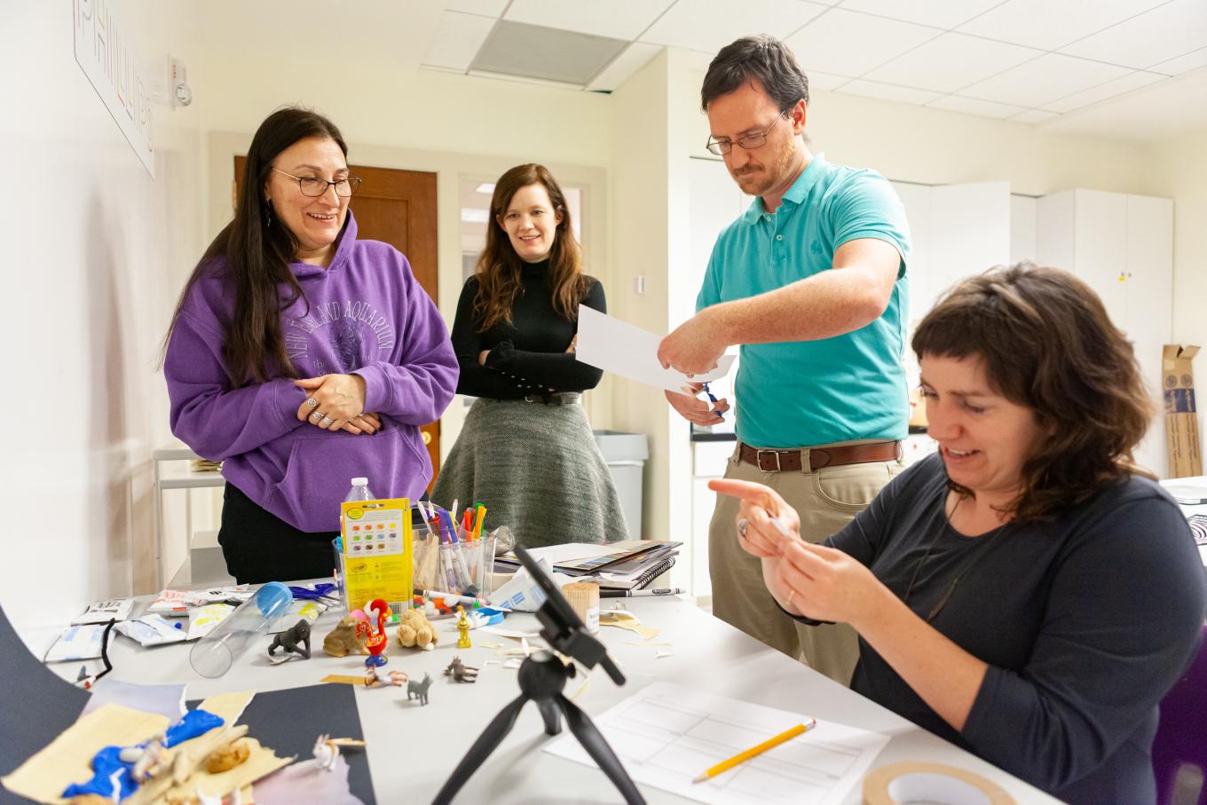 Kory Sutherland (right) with other UMD-Phillips Prism.K12 participants learn how to use stop-motion animation
