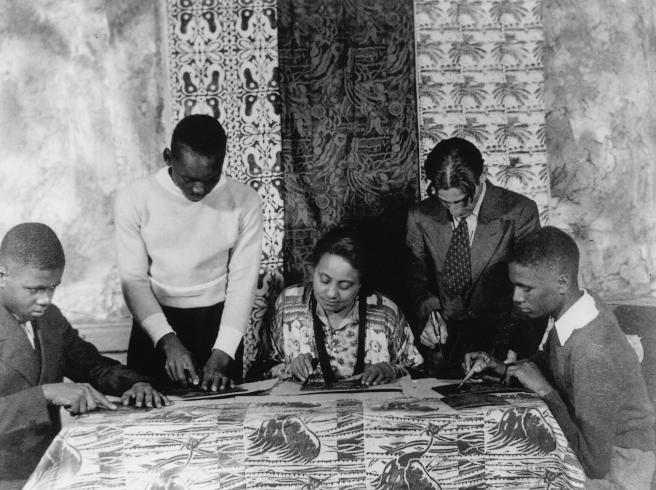 Photograph of Jacob Lawrence making block prints at WPA Federal Art Project Workshop, 1933-34