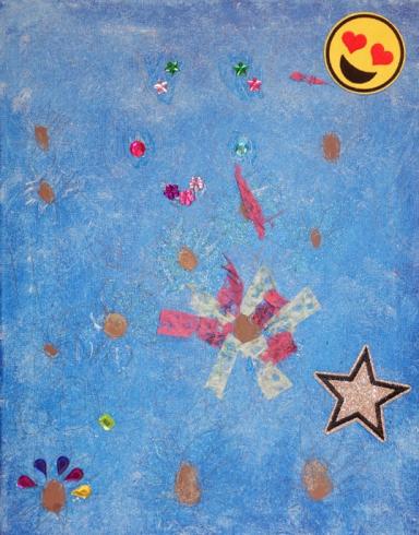 Blue painted canvas with stickers and gems.