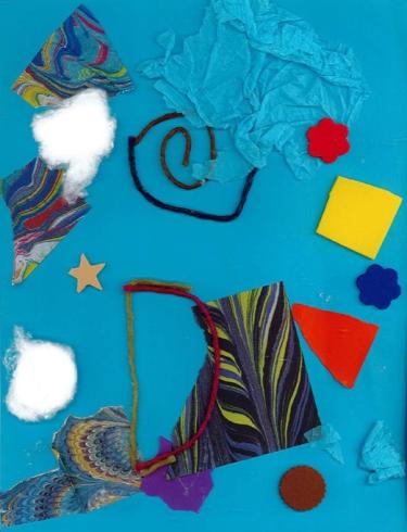 Blue paper with collaged materials and shapes.