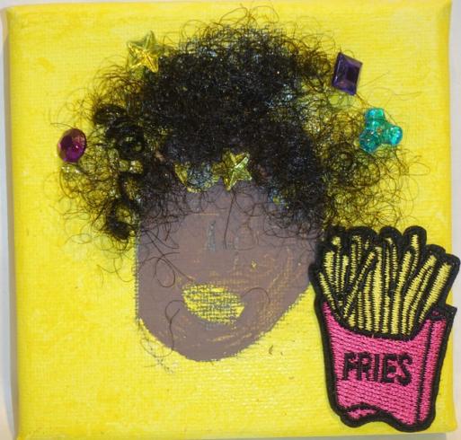 Yellow painted canvas with a person and a "FRIES" sticker.