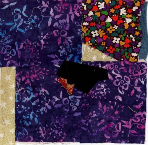 Quilted pattern with various floral fabrics.